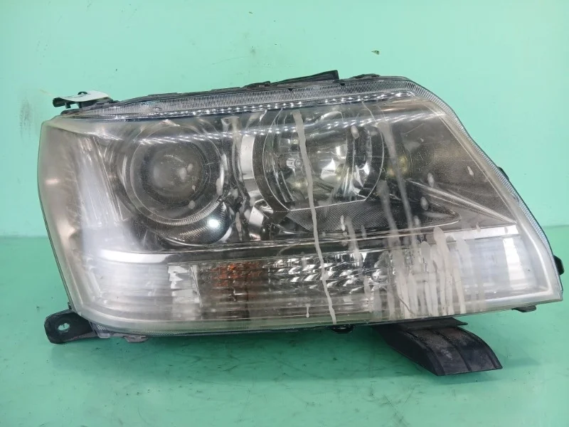 Фара Suzuki Grand Vitara 2 2005-2015
