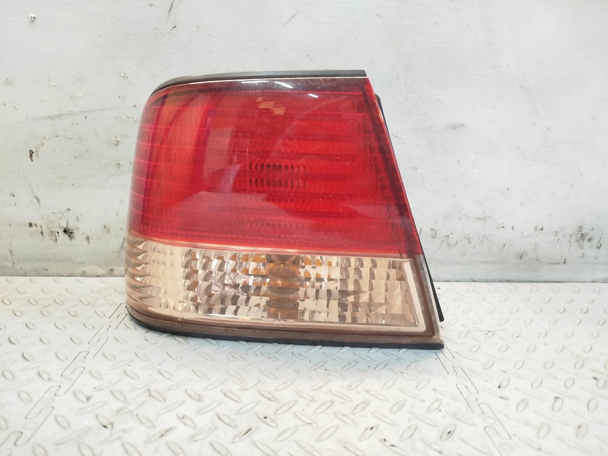 ФОНАРЬ NISSAN ЛЕВЫЙ 265558N025 KE766