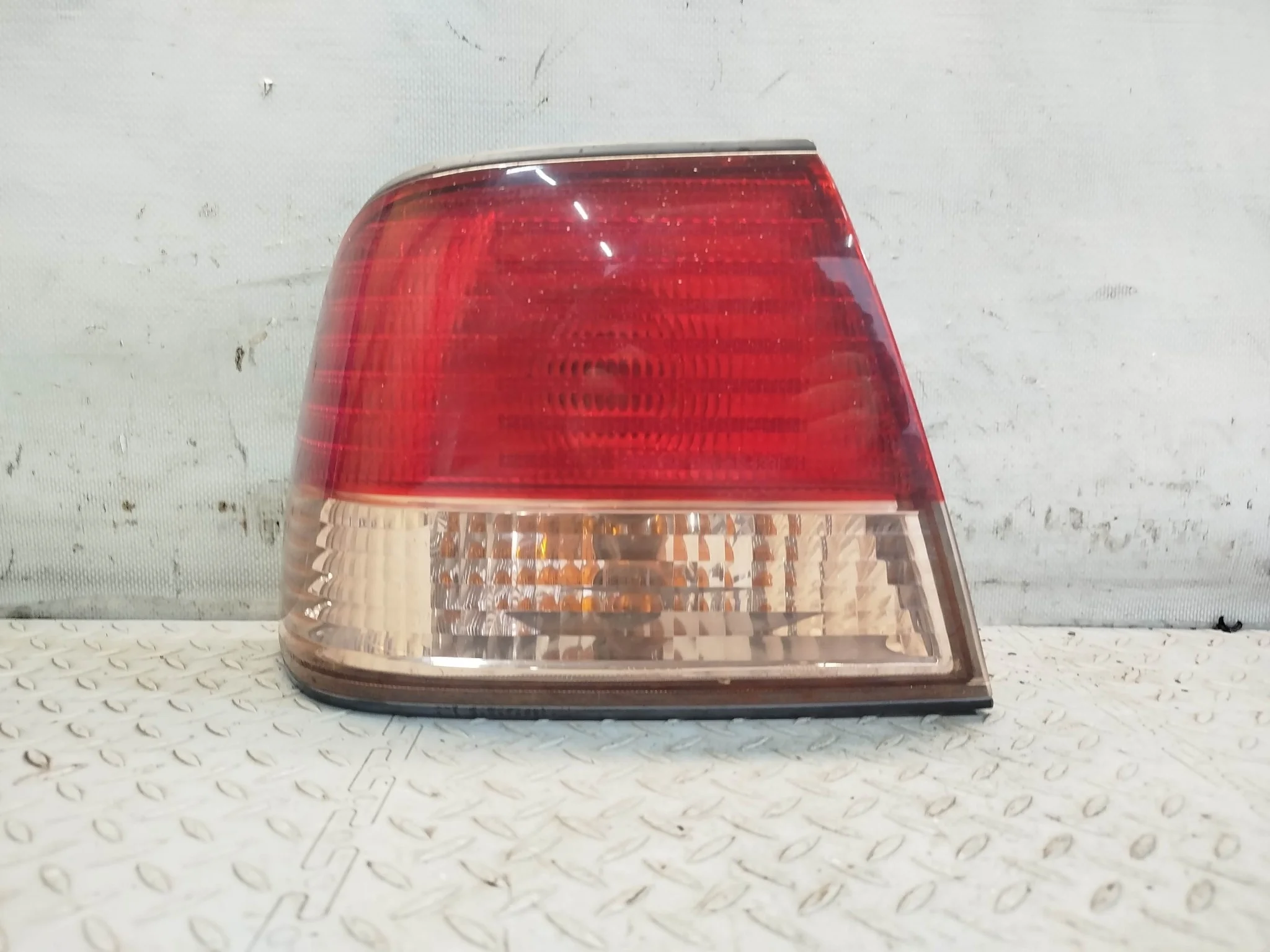 ФОНАРЬ NISSAN ЛЕВЫЙ 265558N025 KE772