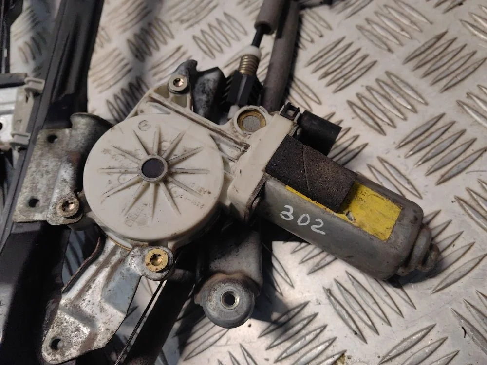 Мотор стеклоподъемника пер. прав. Ford Focus 1