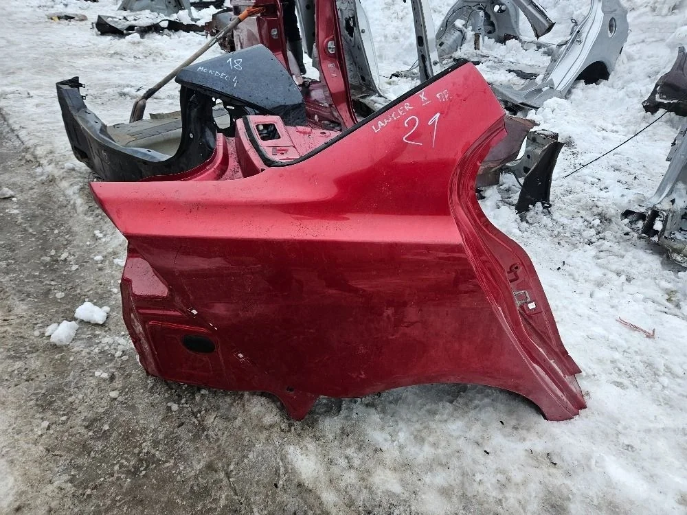 Крыло заднее правое на Lancer 10