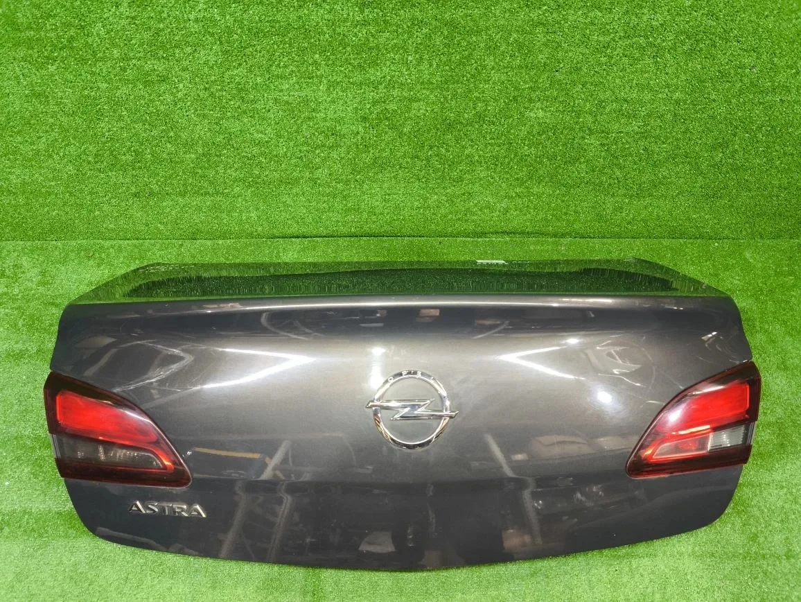 Крышка багажника OPEL ASTRA J 2010- седан серая б/у ASTRA J(2009-2017)