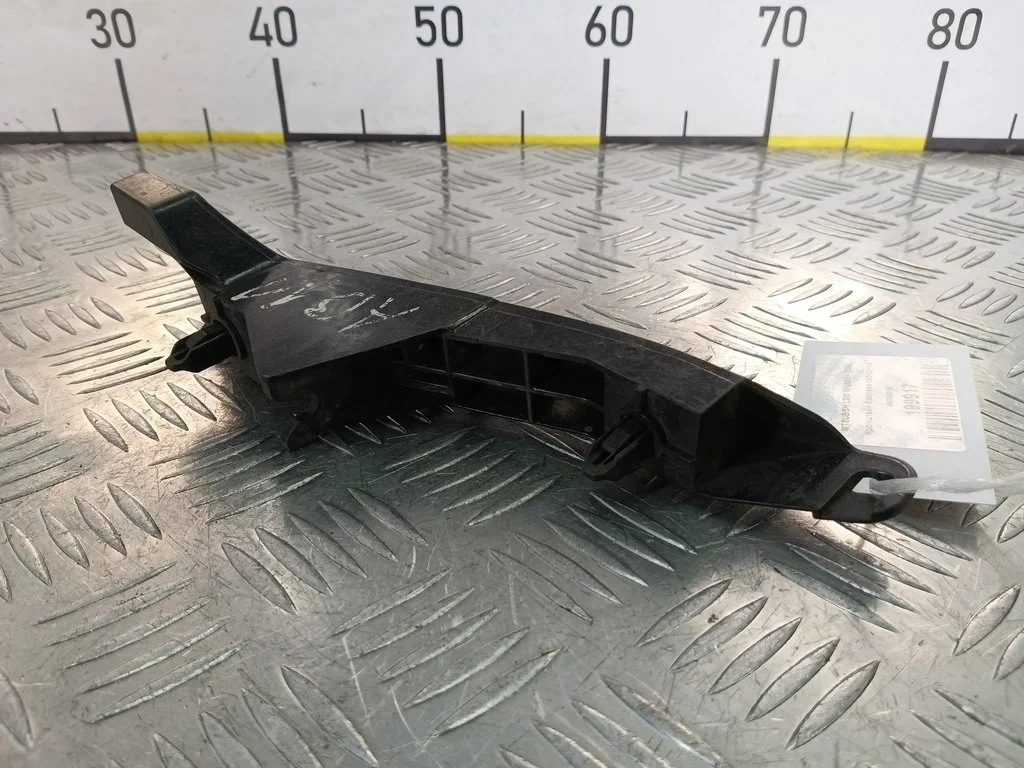 Кронштейн бампера передний MITSUBISHI L200 IV (20