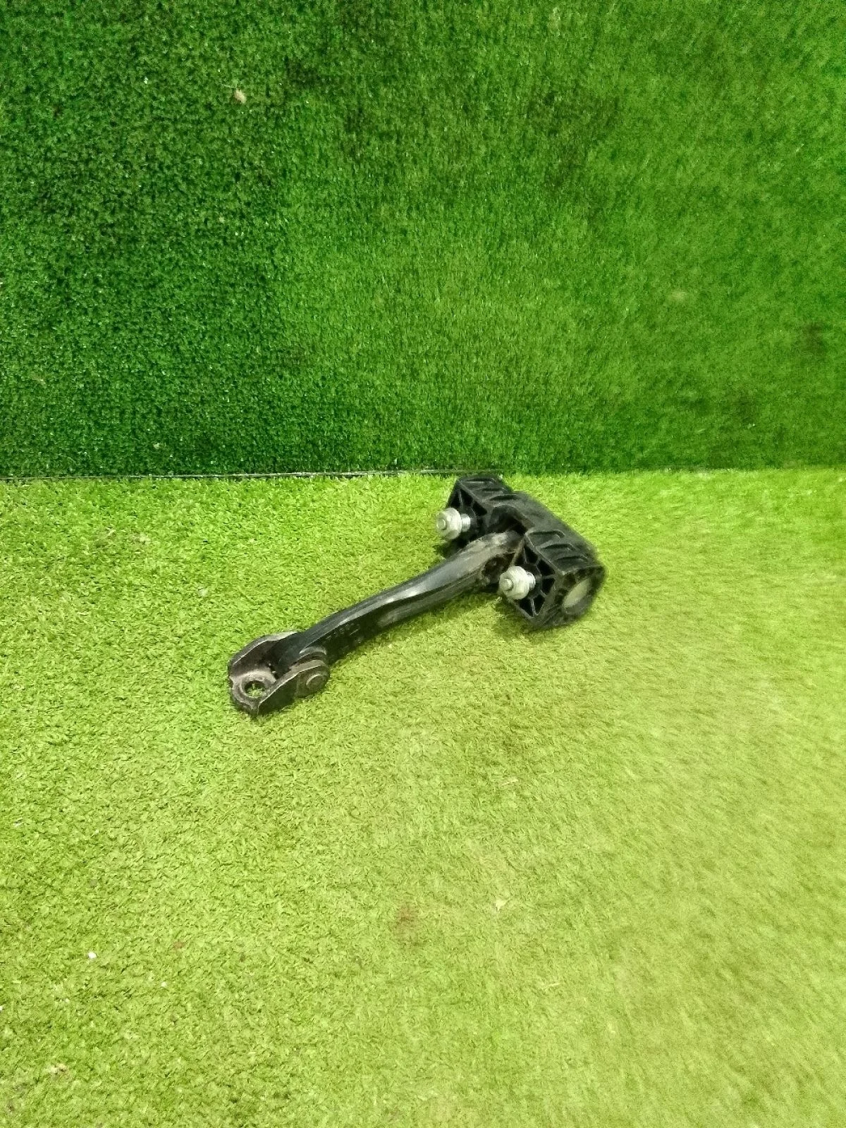 Ограничитель двери Opel Astra H (2004—2007)