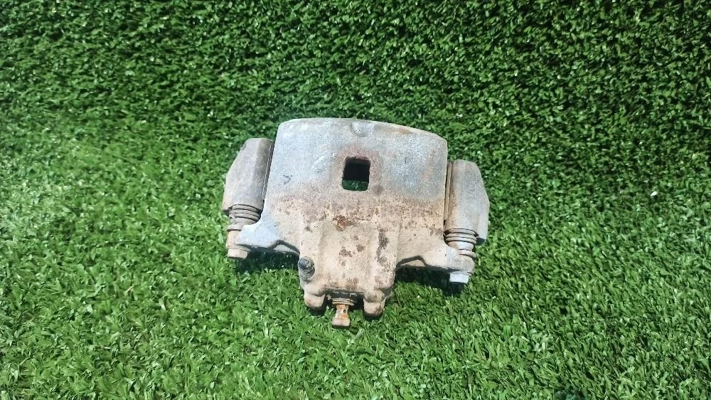 Суппорт тормозной Mitsubishi Lancer IX рестайлинг (2005—2010)