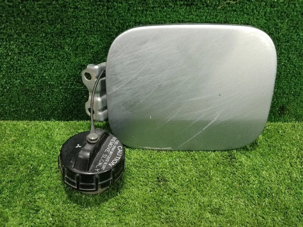 Лючок бензобака Mitsubishi Lancer IX (2000—2007)