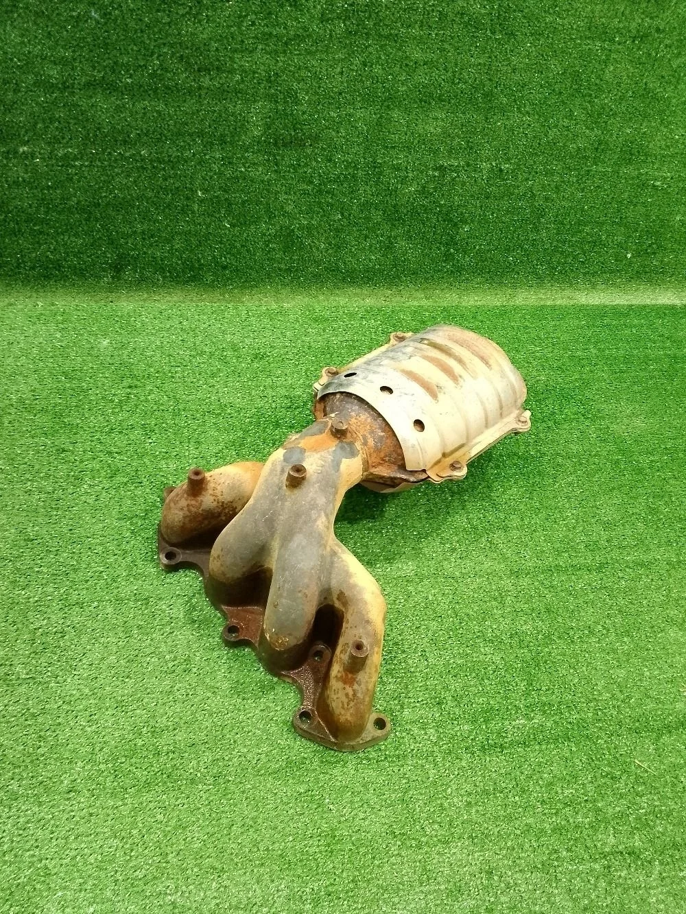 Коллектор выпускной Kia Rio I (1999—2002)