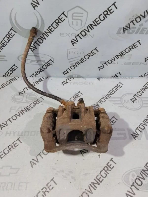 Суппорт тормозной Kia Ceed ED рестайлинг (2009—2012)