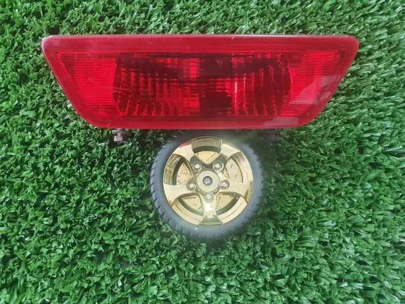 Фонарь задний противотуманный Nissan X-Trail II рестайлинг (2010—2015)