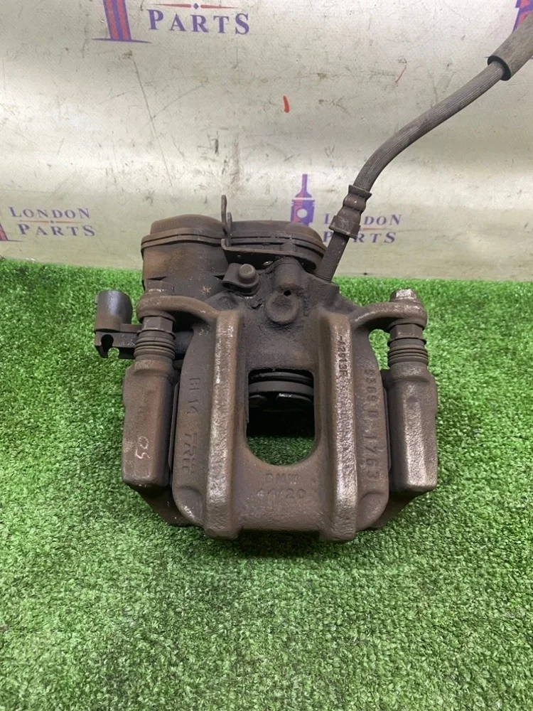 Суппорт тормозной BMW F10