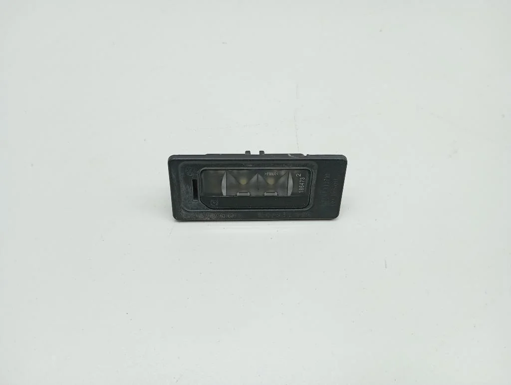 Фонарь подсветки номера Volkswagen Polo 5 2016