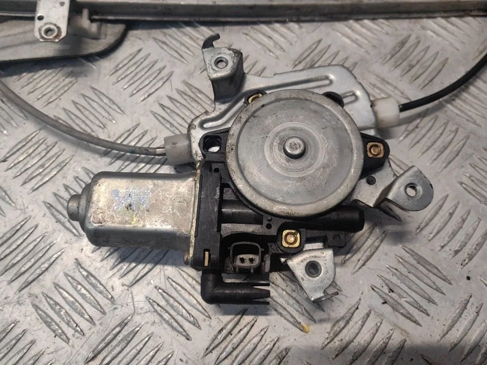 Моторчик стеклоподъемника з. п. Nissan X-Trail T30