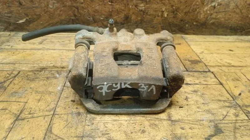 Суппорт тормозной Nissan Juke 2011-2019 F15