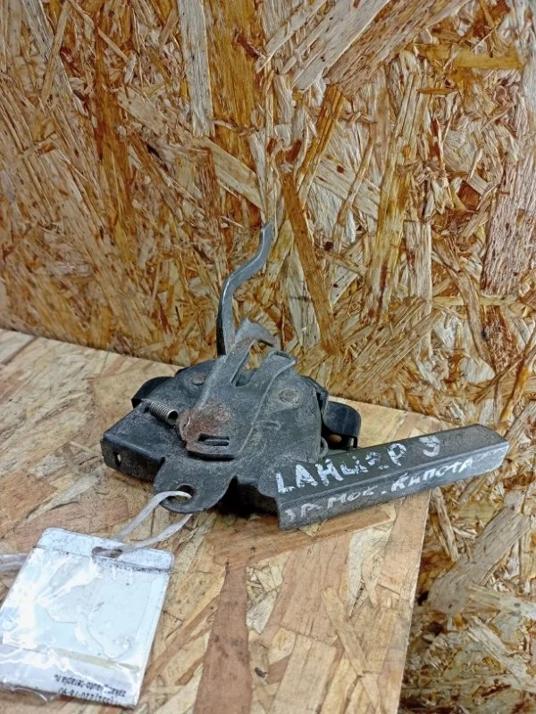 Замок капота Mitsubishi Lancer 9