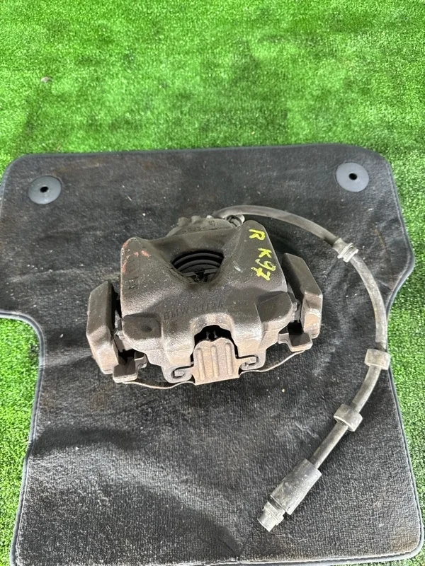 Суппорт тормозной BMW X1 2009-2015 E84