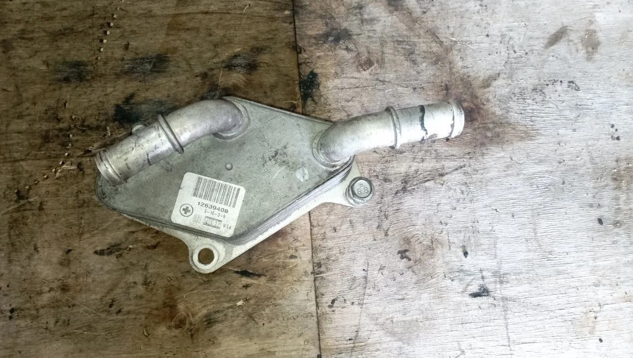 Теплообменник масляного фильтра 12639408 Opel Insignia 1 2.0 Бензин