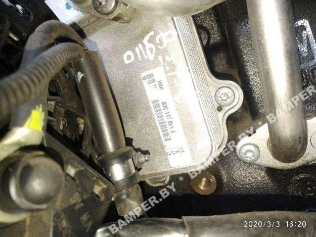 Теплообменник масляного фильтра 03C117021J Skoda Octavia A5 restailing 1.4