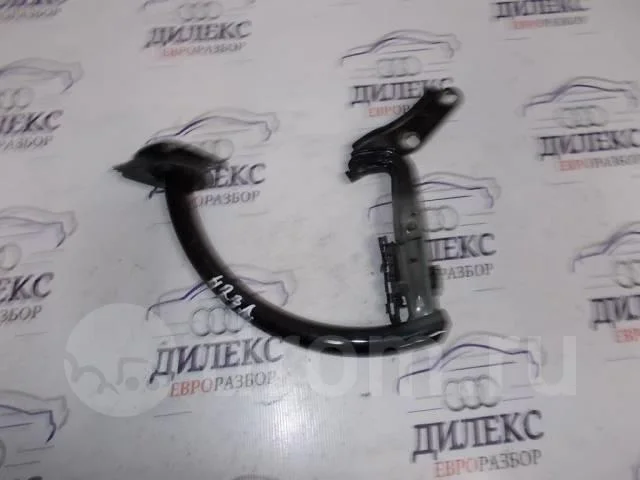 петля крышки багажника VW Passat (B6) 2005-2010 L -