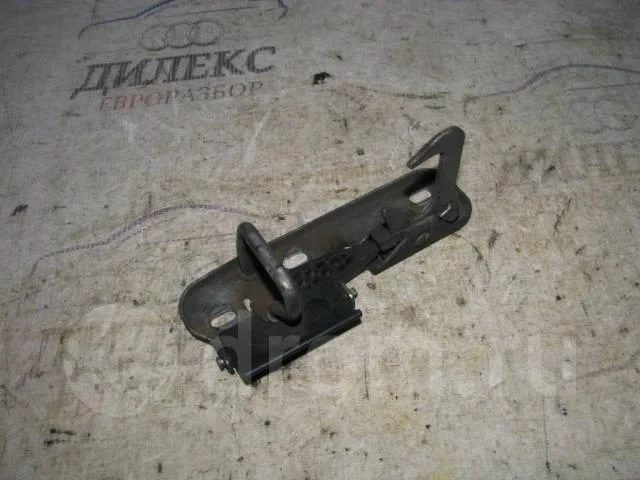 крючок капота VW Tiguan 2007-2011 - -
