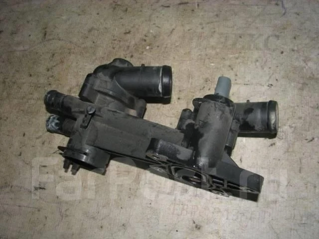 корпус термостата VW Touran 2003-2010 - -