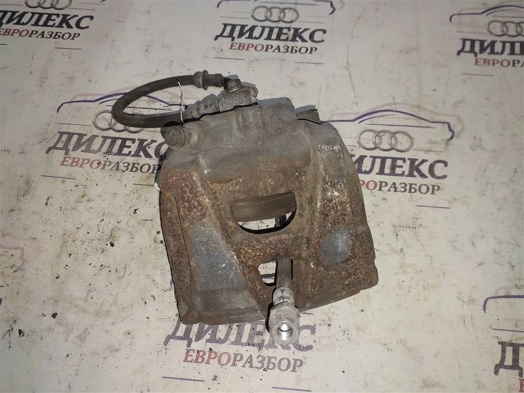 суппорт VW Tiguan 2007-2011 R F