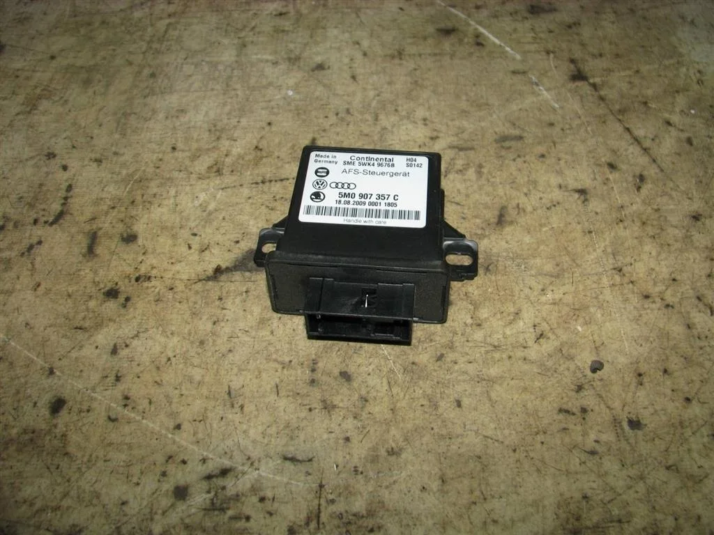 блок управления системы адаптивного освещения VW Tiguan 2007-2011 - -