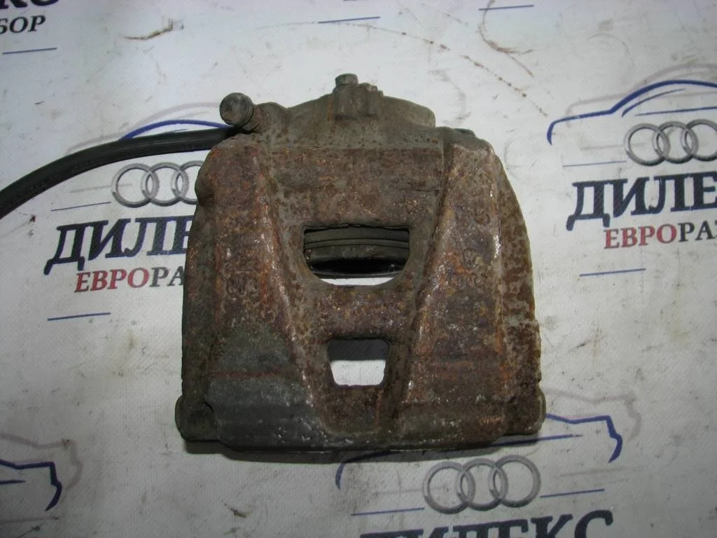 суппорт VW Tiguan 2007-2011 R F