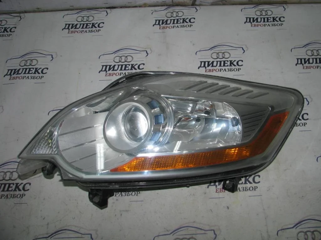 фара Ford Kuga 2008-2012 L -