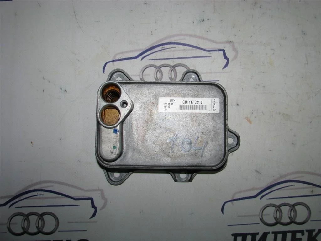 радиатор масляный VW Passat (B7) 2011-2015 - -