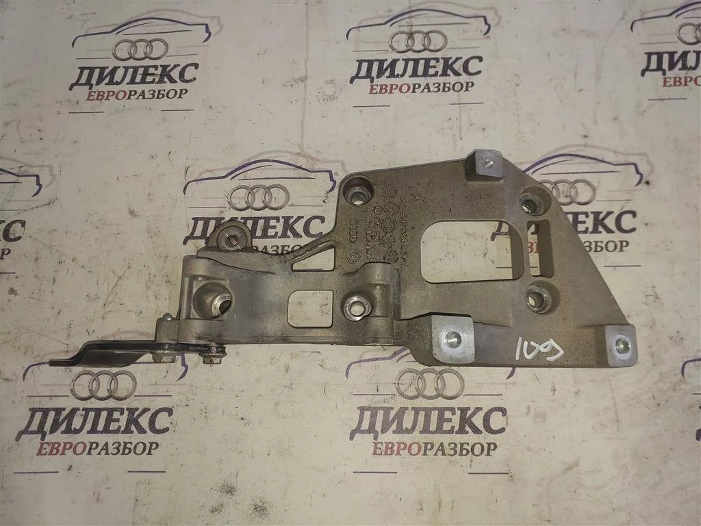 кронштейн генератора VW Passat (B6) 2005-2010 - -