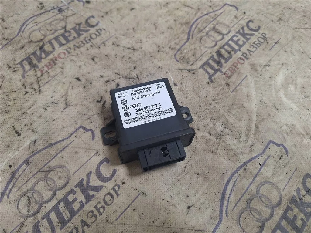 блок управления системы адаптивного освещения VW Passat (B6) 2005-2010 - -