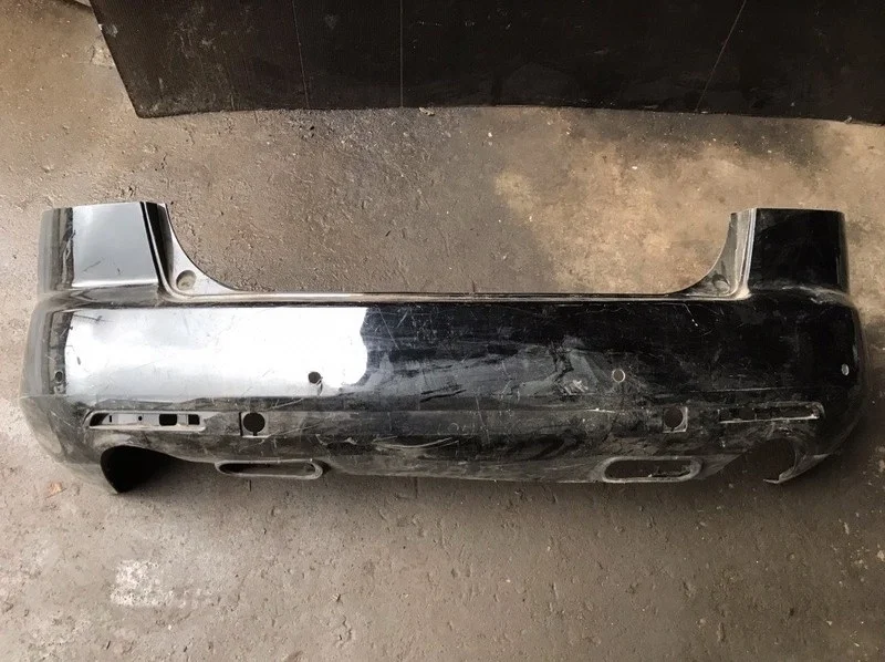 Бампер Mazda CX-7 2006-2010 EG2150221, задний