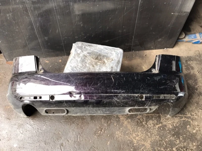 Бампер Mazda CX-7 2006-2012 EG2150221, задний