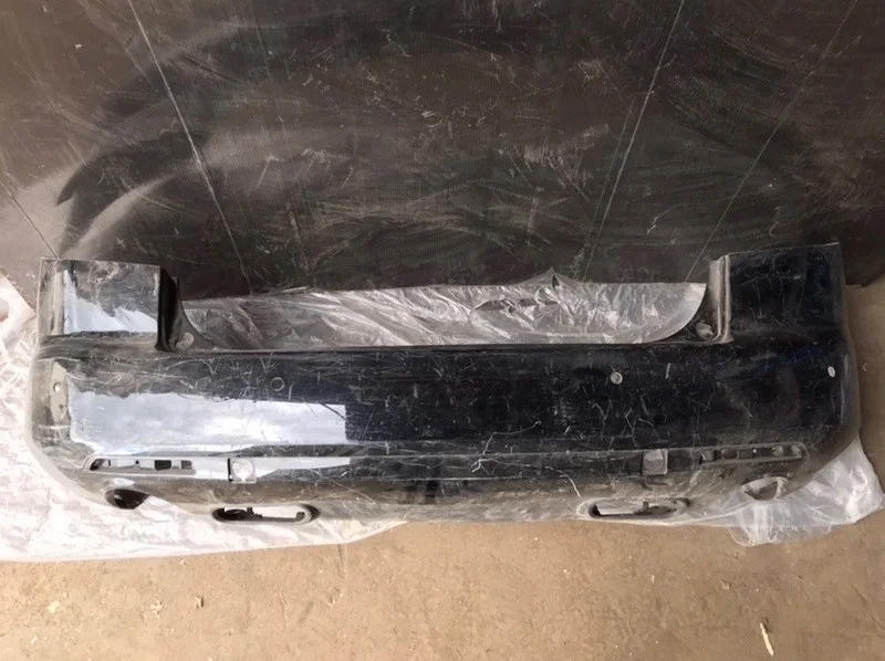 Бампер Mazda CX-7 2006-2012 EG2150221, задний