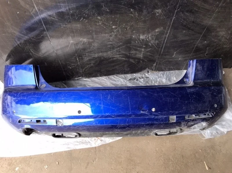 Бампер Mazda CX-7 2006-2012 EG2150221, задний