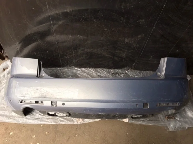 Бампер Mazda CX-7 2006-2010 EG2150221, задний