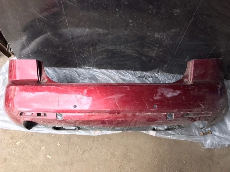 Бампер Mazda CX-7 2006-2012 EG2150221, задний
