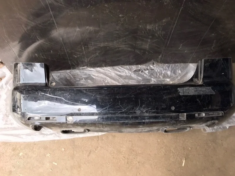 Бампер Mazda CX-7 2006-2012 EG2150221, задний