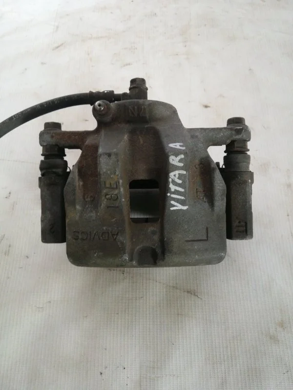 Суппорт Suzuki Grand Vitara 2005-2016 5510265J04999, передний левый