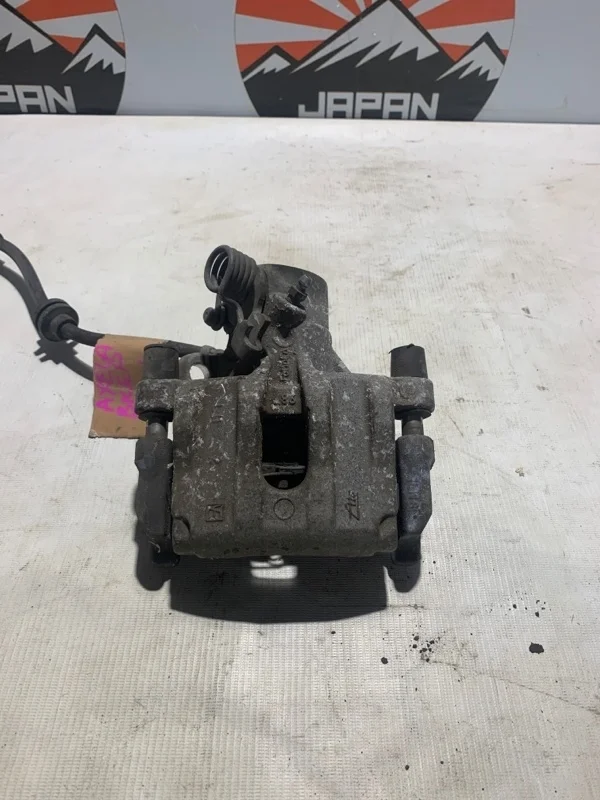 Тормозной суппорт Mazda 3 2007-2012 BPYK2671XC BL, задний левый