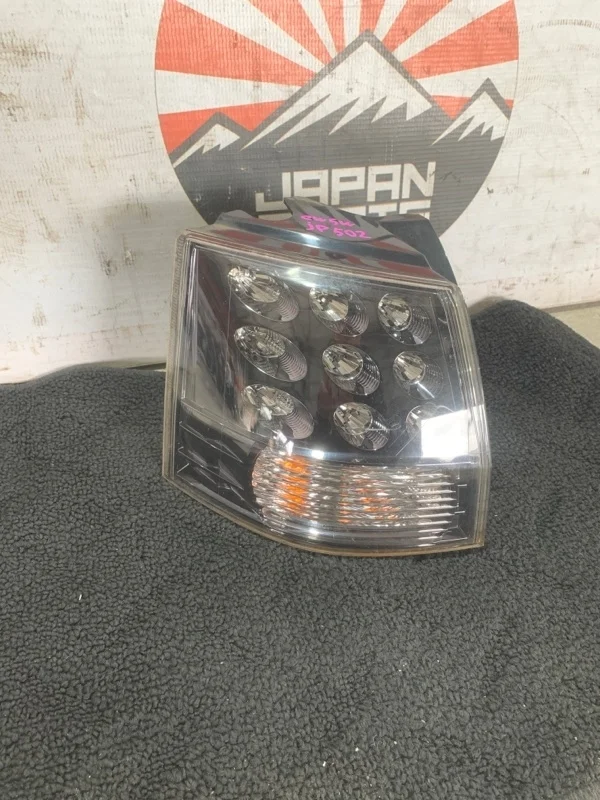 Фонарь Mitsubishi Outlander 8330A379 XL, левый