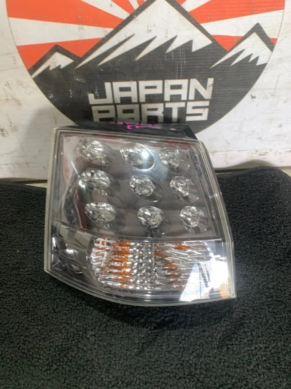 Фонарь Mitsubishi Outlander 8330A379 XL, левый