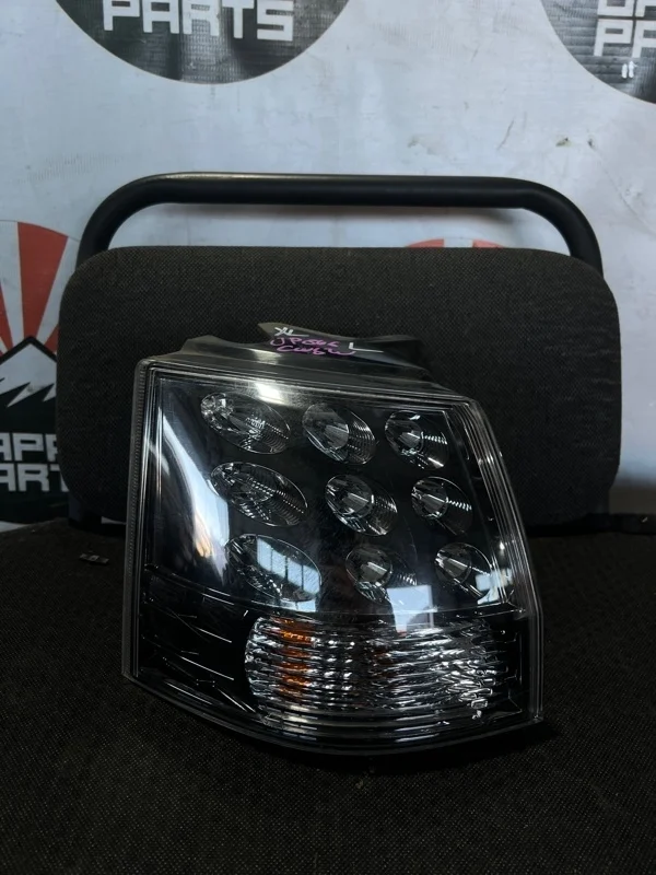 Фонарь Mitsubishi Outlander 2009 8330A379 XL, левый