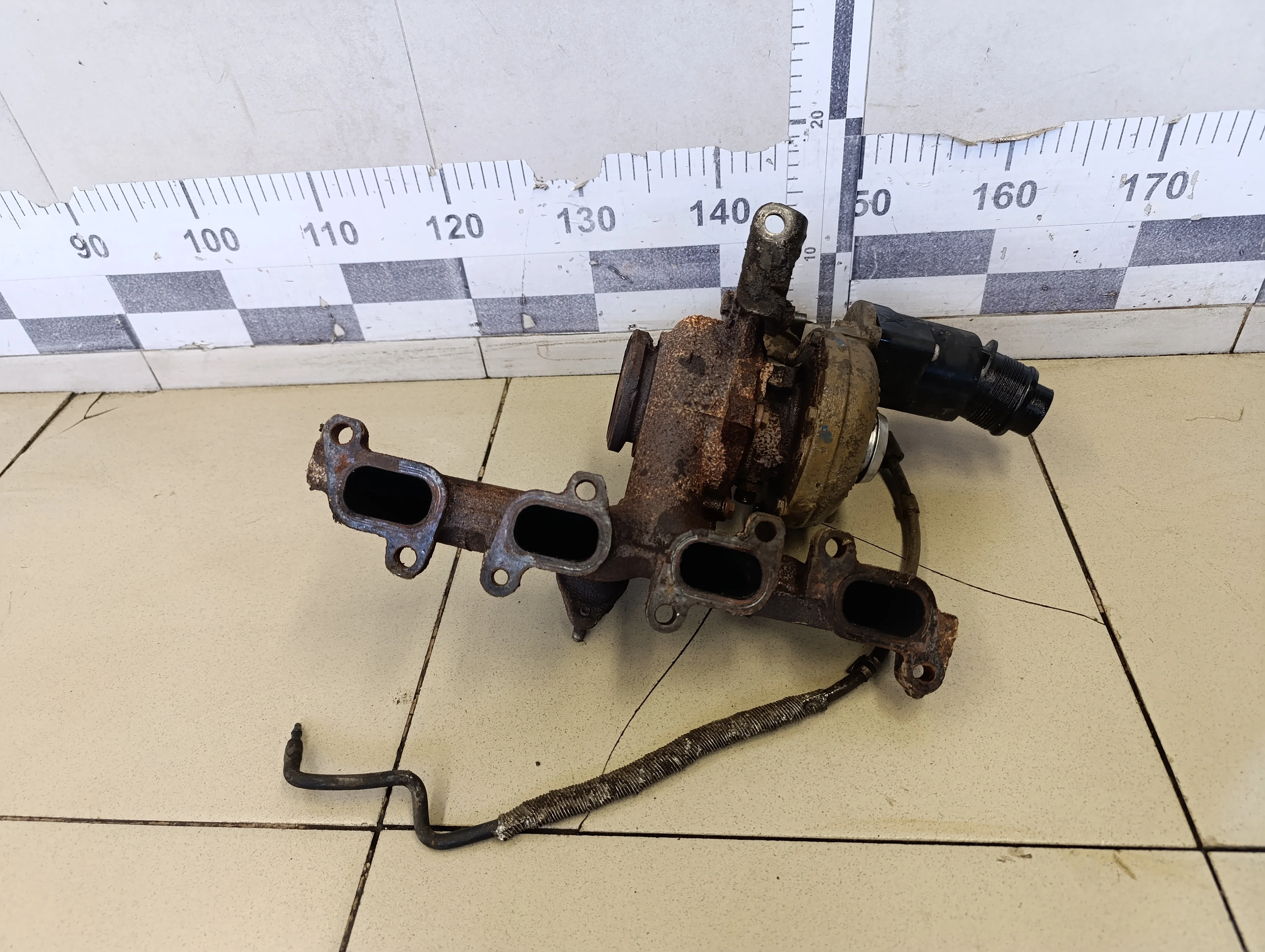 Коллектор с турбокомпрессором (турбиной) Transporter T5 2003-2015