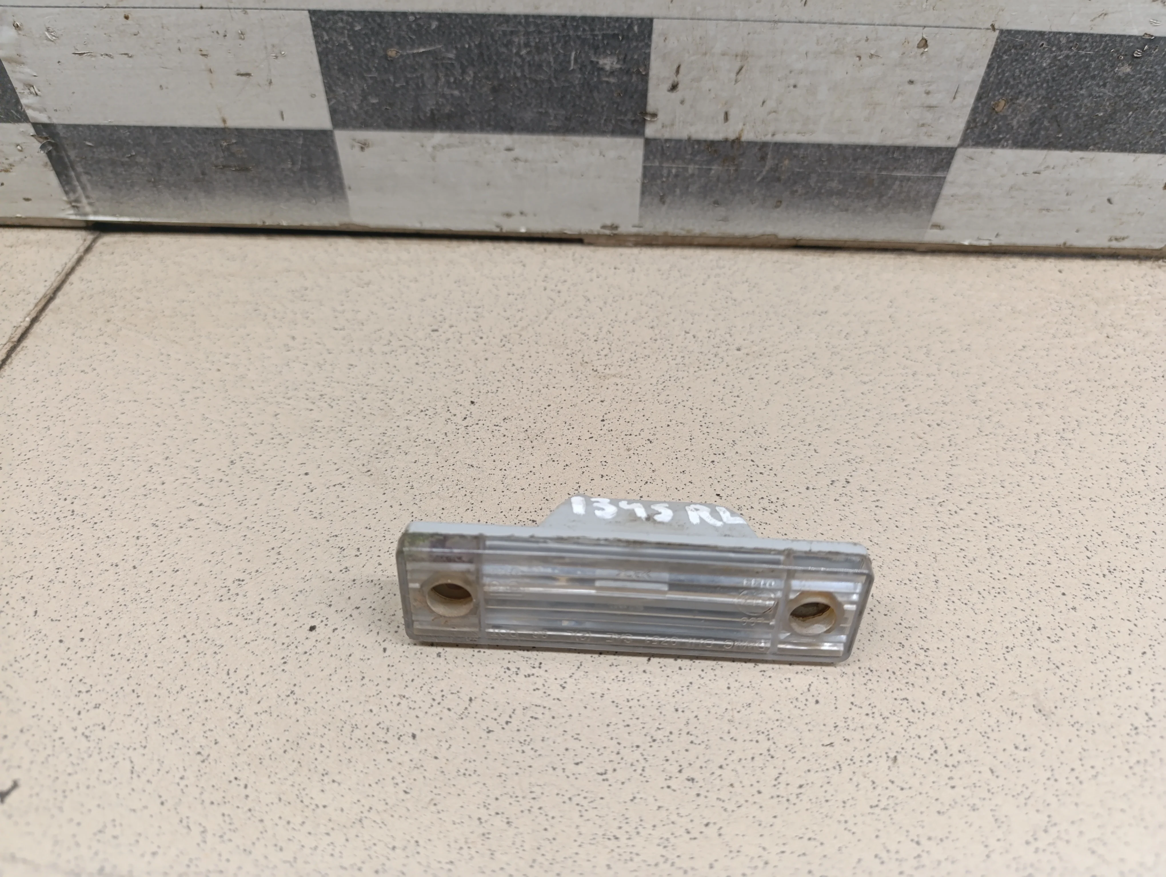 Фонарь подсветки номера Aveo (T200) 2003-2008