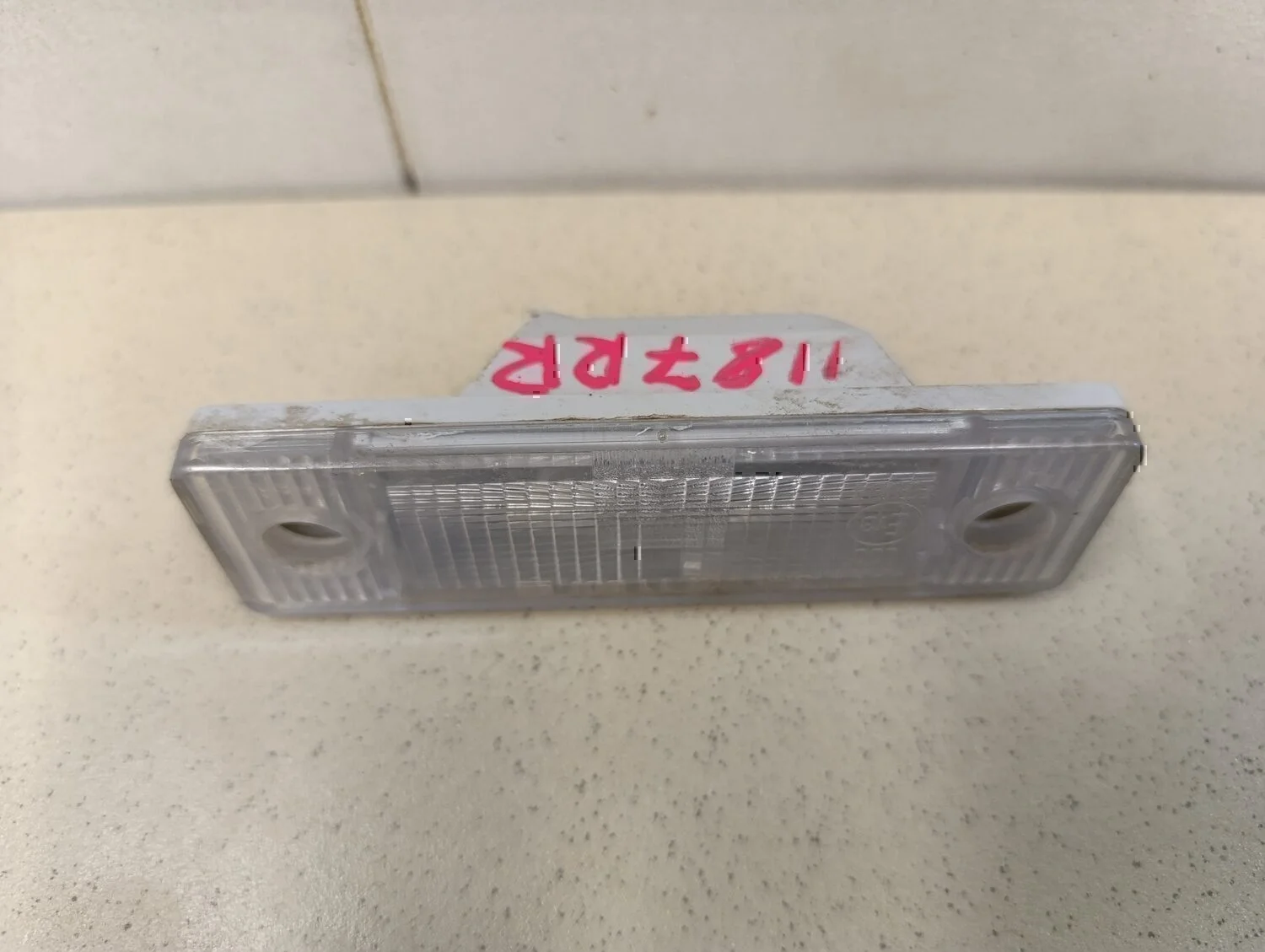 Фонарь подсветки номера Aveo (T200) 2003-2008