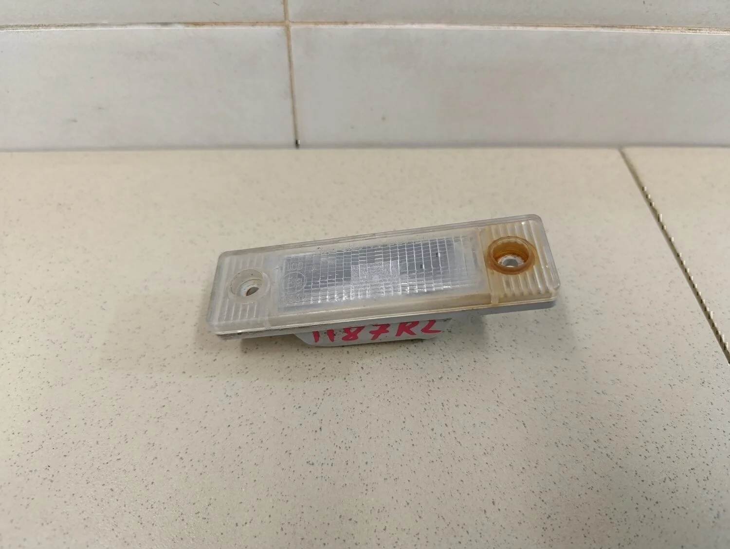 Фонарь подсветки номера Aveo (T200) 2003-2008