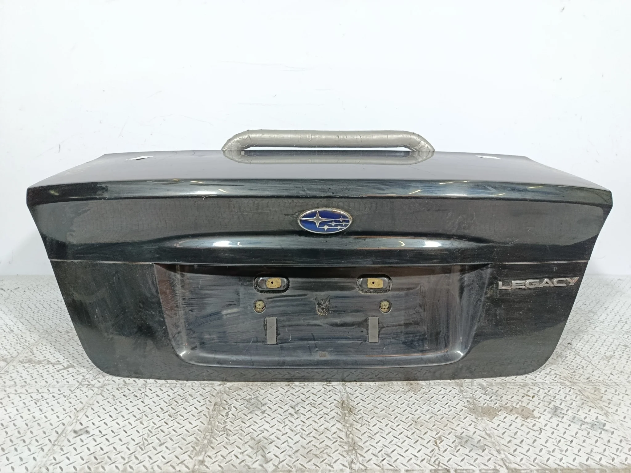 КРЫШКА БАГАЖНИКА SUBARU LEGACY 57509AG0009P черный, 32J TA1821