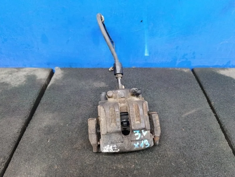 Суппорт тормозной BMW X1 (E84) 34216768697, задний левый