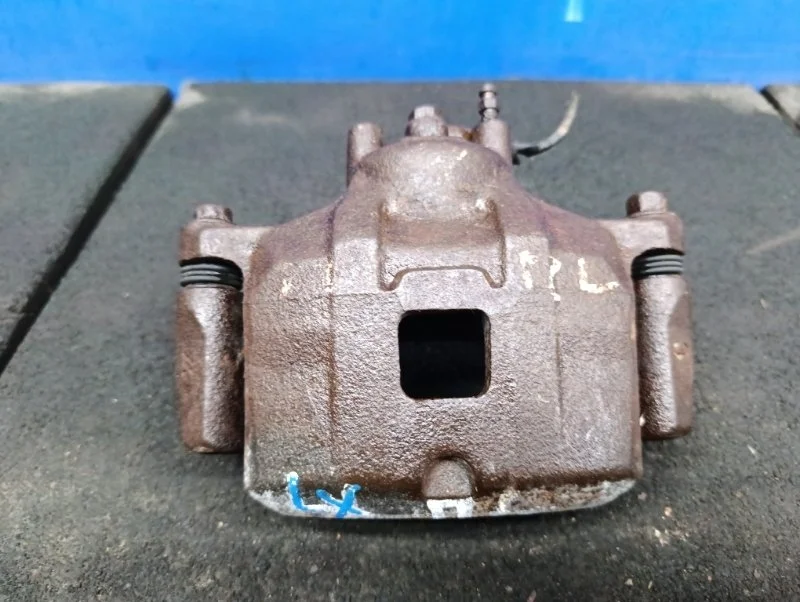 Суппорт тормозной Mitsubishi Lancer 2010 4605A475 CY5A 1.8 4B10, передний левый